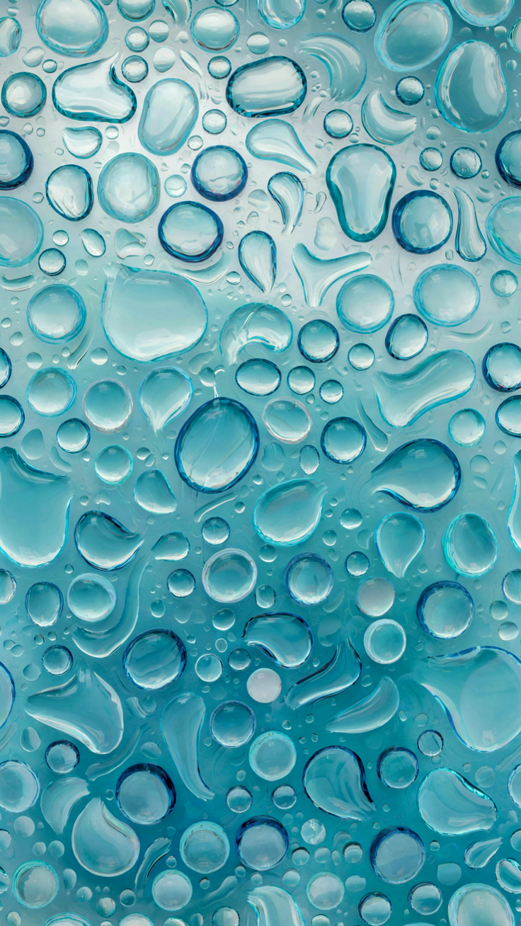 A calming water droplet and teardrop-shaped pattern in fresh blue tones, evoking a sense of tranquility and renewal.